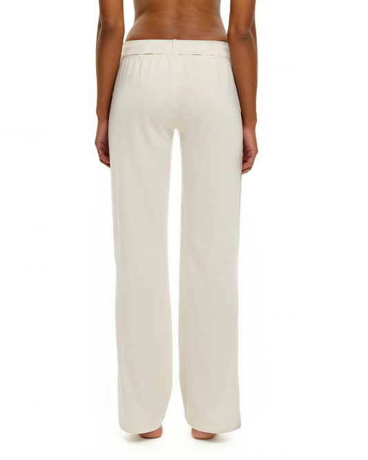 White wide-leg trousers with elastic waistband, back view
