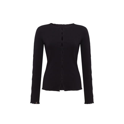 Black long-sleeve draped top with ribbed texture and vertical button placket