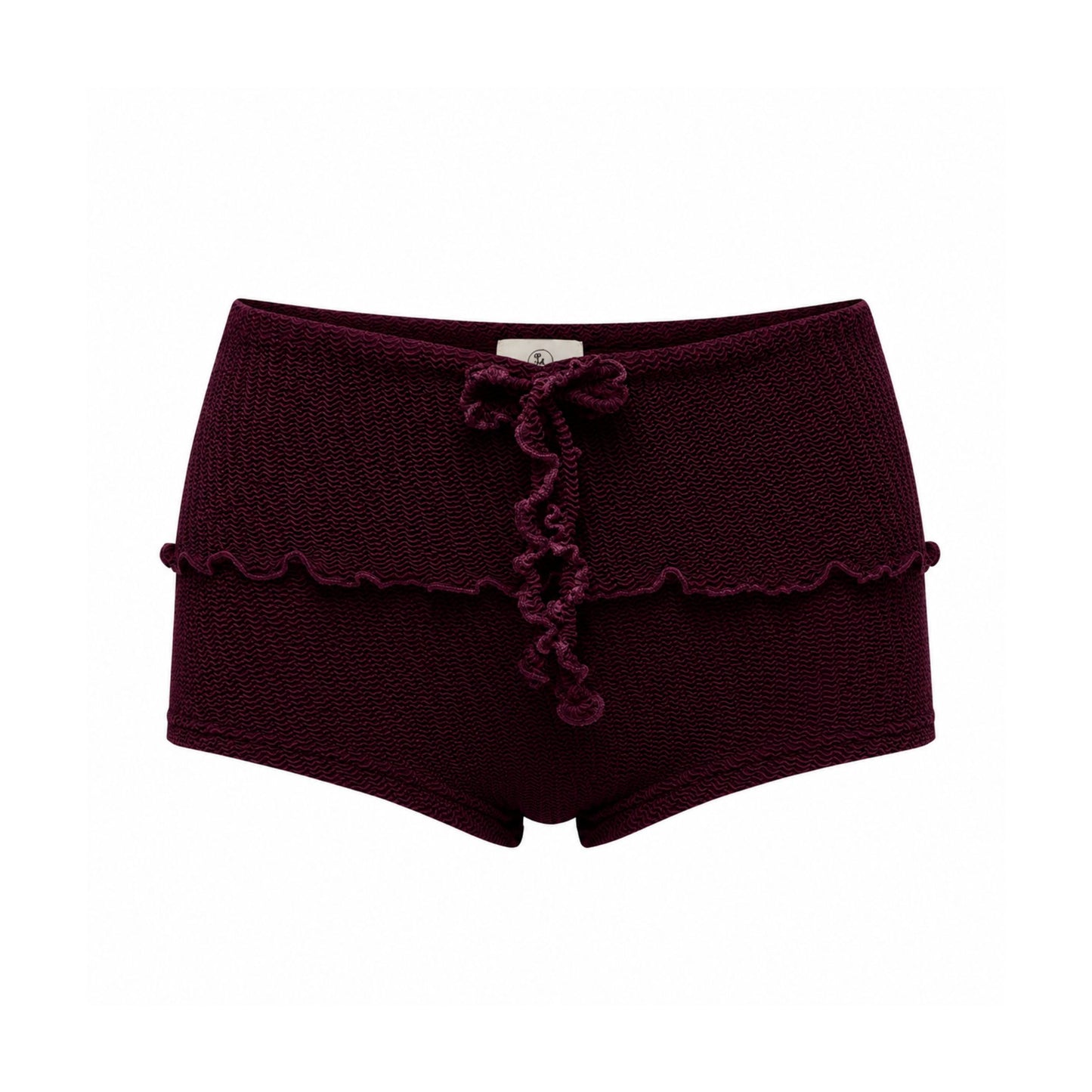 Bow-tie swim shorts in dark maroon with scalloped trim and short legs