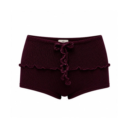 Bow-tie swim shorts in dark maroon with scalloped trim and short legs
