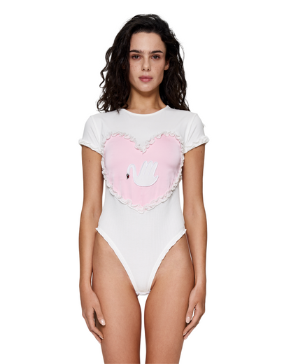 White ribbed bodysuit with short sleeves and pink heart with swan appliqué