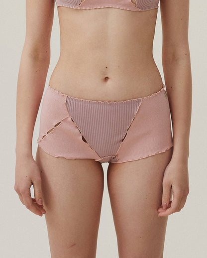 Pink ribbed boyshorts with high-rise brief cut and V-shaped seam detail
