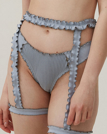 Blue ribbed tanga with frayed scalloped ruffle trim at waistband and leg openings