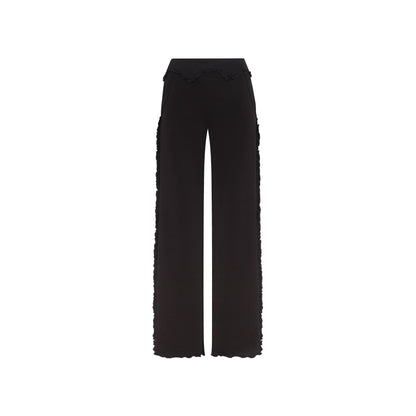 Black wavy-edge pants, wide straight legs, elastic waistband.