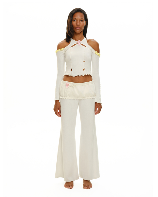 White wide-leg pants with ruched elastic waistband and loose flared legs