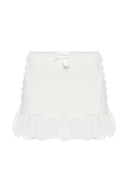White skort with ruffled tiers and bow-tie waist