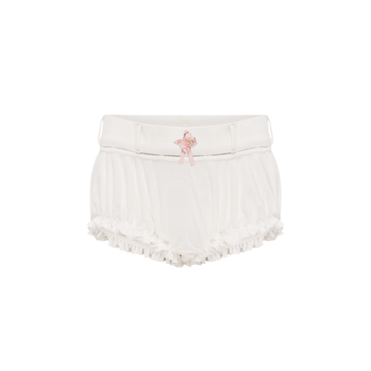 White shorts with elastic waistband and pink rosette detail