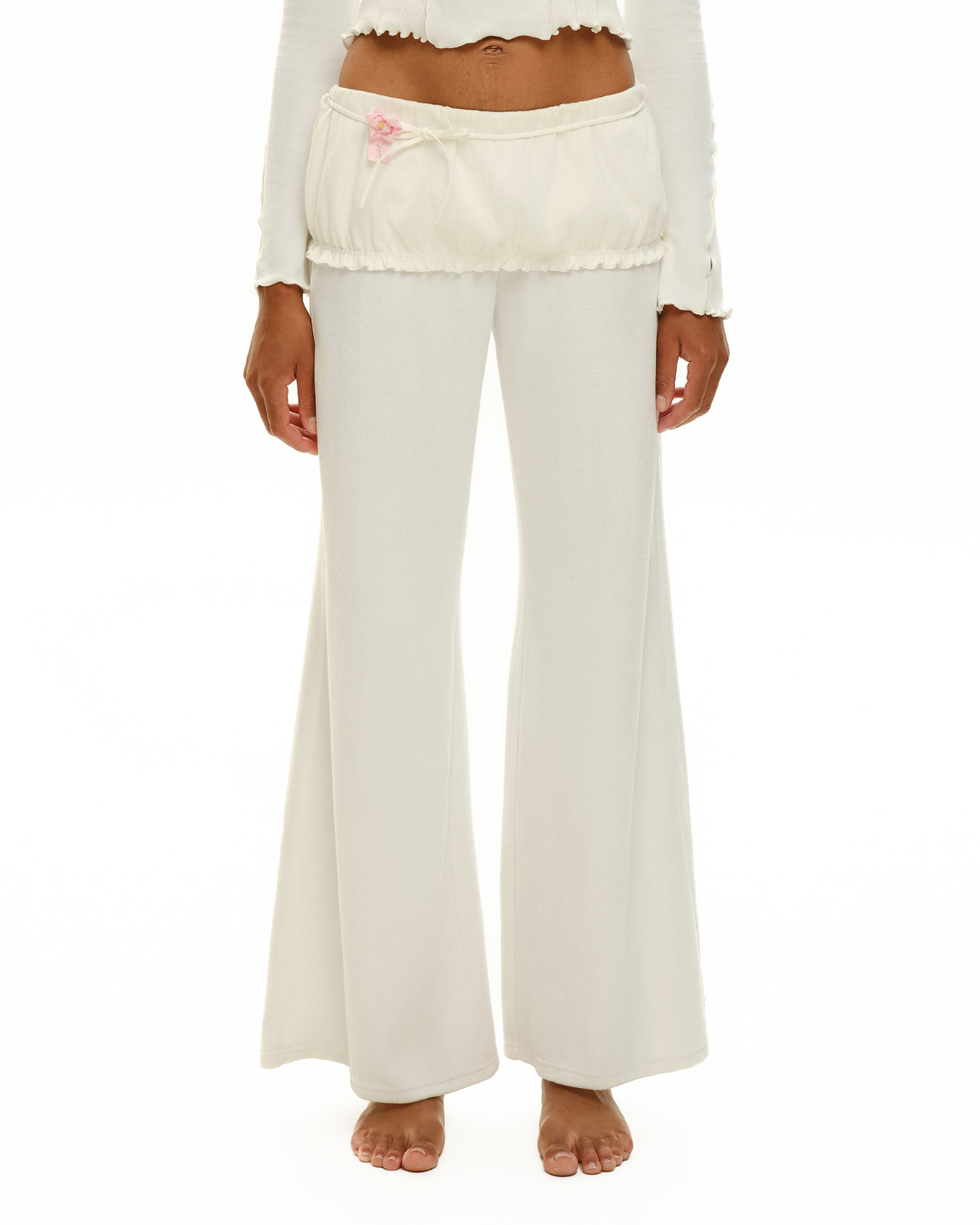 White wide-leg pants with elastic ruched waistband and center drawstring