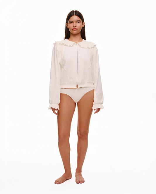 White ruffle-hoodie with front zipper, gathered cuffs and hem detail