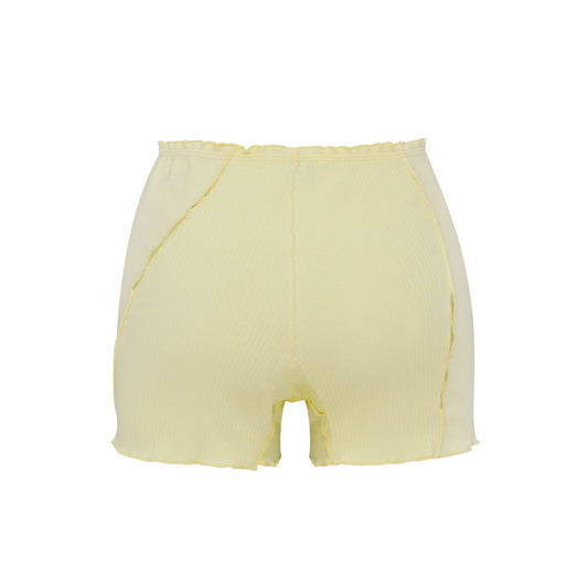 Light yellow shorts with elastic waistband and center seam, raw hem