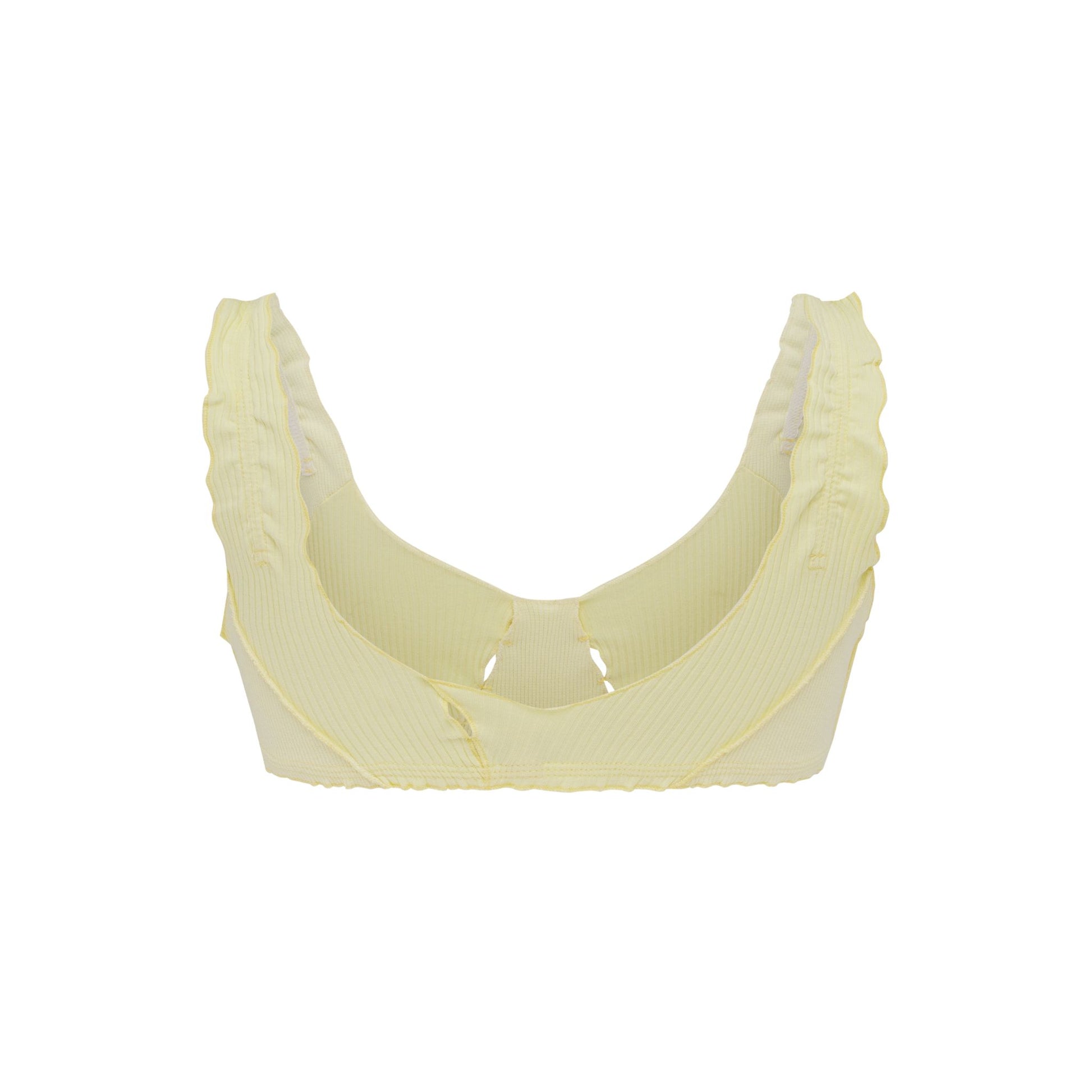 Pale yellow bralette with ruffled arm openings and soft curved cups