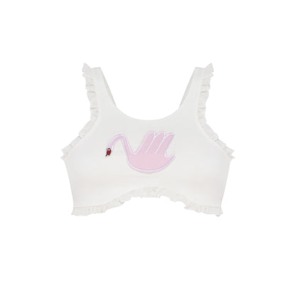 White ruffle-trim tank top with pink swan applique, scoop neckline and cropped fit