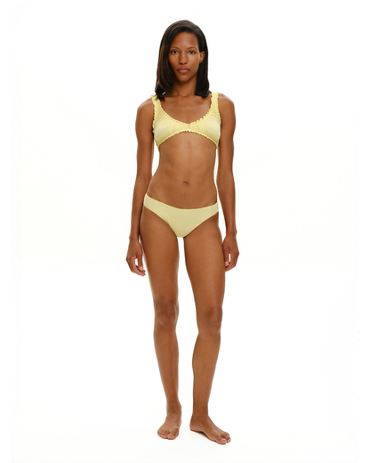 Yellow seamless tanga underwear worn by model