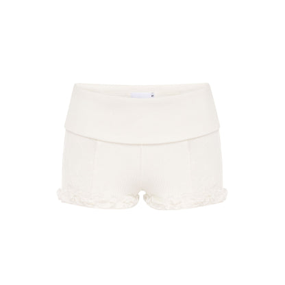 White lace shorts with wide waistband and scalloped hem