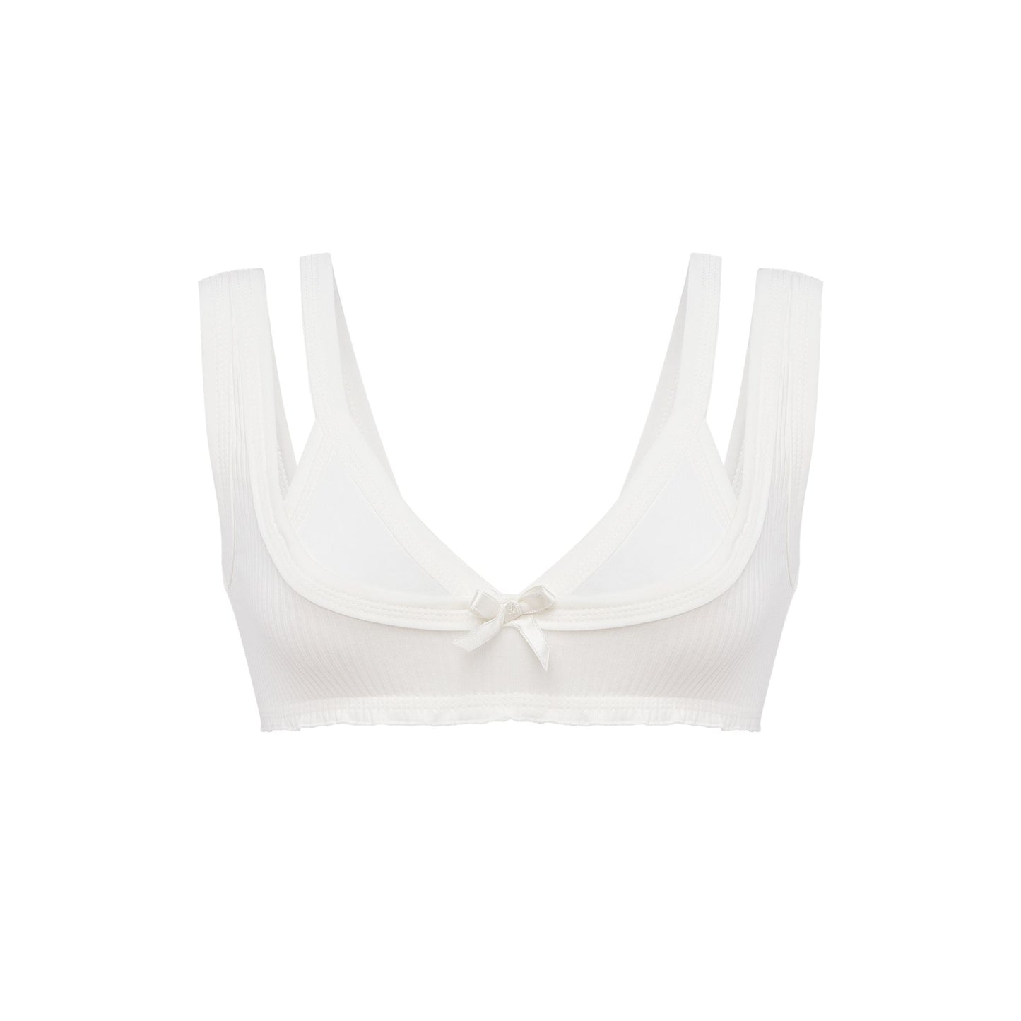 White bralette top with scalloped scoop neckline, thin straps, and center bow detail
