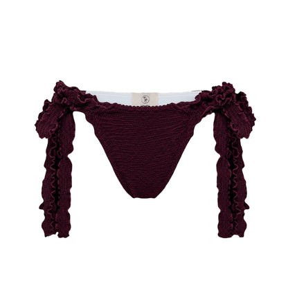 Bikini tanga bottoms with side ties, dark burgundy ruffle trim