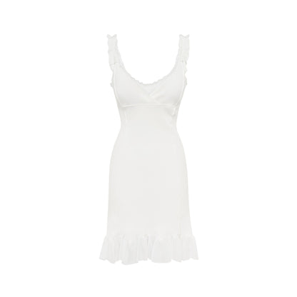 White fitted slip dress with V-neckline and ruffled hem