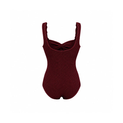 One-piece swimsuit in dark burgundy with high scoop neckline and slim shoulder straps