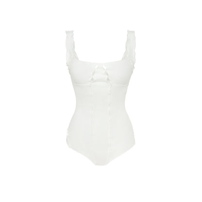 White wavy bodysuit with scoop neckline and ribbed knit texture
