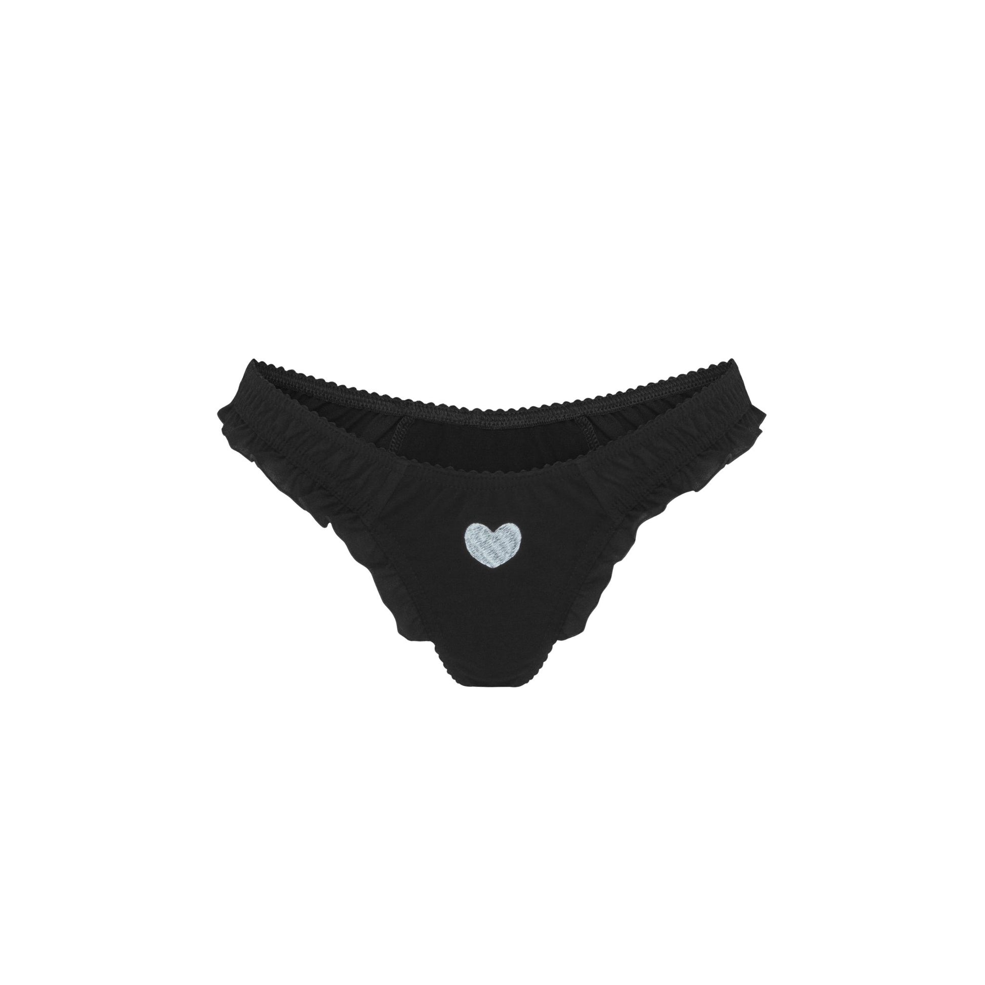 Black tanga with ruffled trim and small heart patch at center