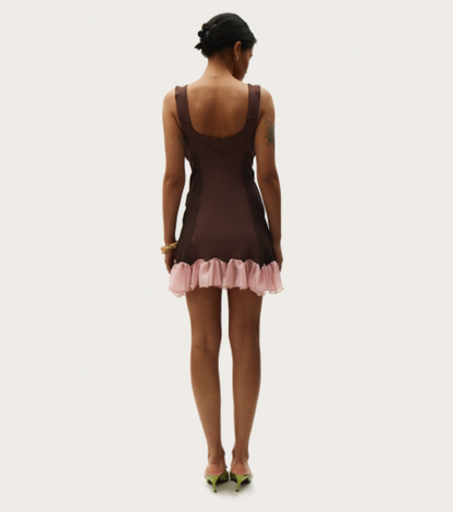 Brown mini dress with open back and pink ruffled hem, thin shoulder straps