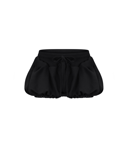 Black micro shorts with ruffled legs and drawstring at elastic waistband