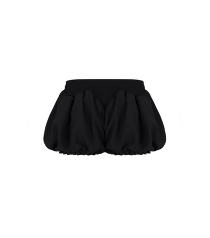 Black micro shorts with twin bow drawstrings and gathered ruffle hem