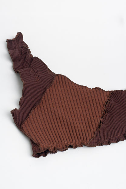 Brown ribbed bralette top flat lay with scalloped hem and black trim