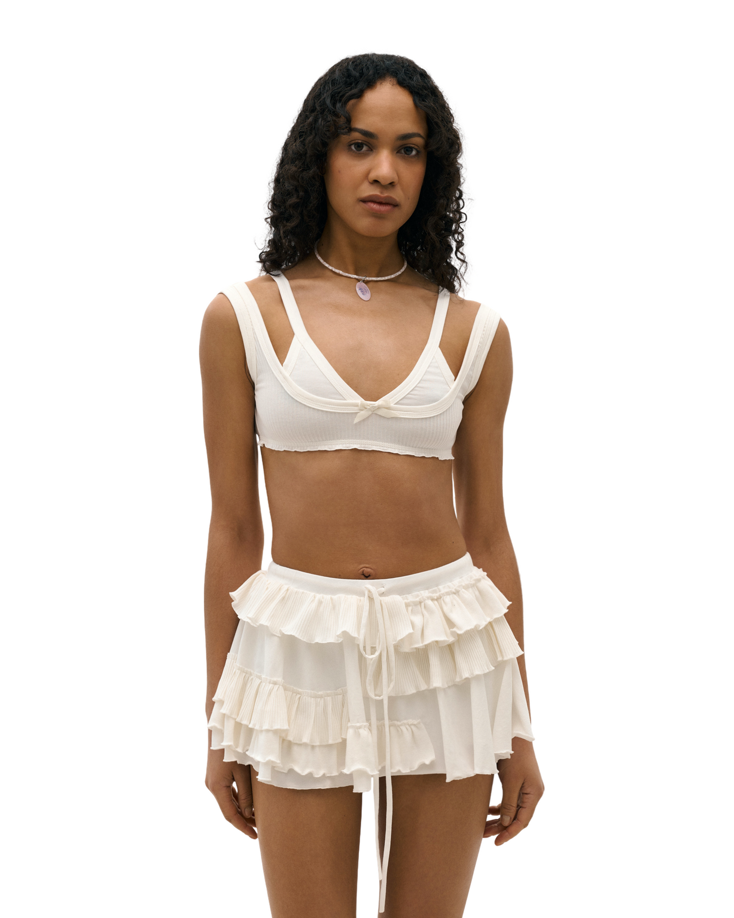 White ruffled tier skort with elastic waist and drawstring ties