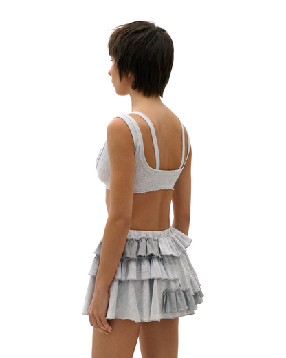 Light gray ruffle skort, back view, tiered flounces with elastic drawstring waist