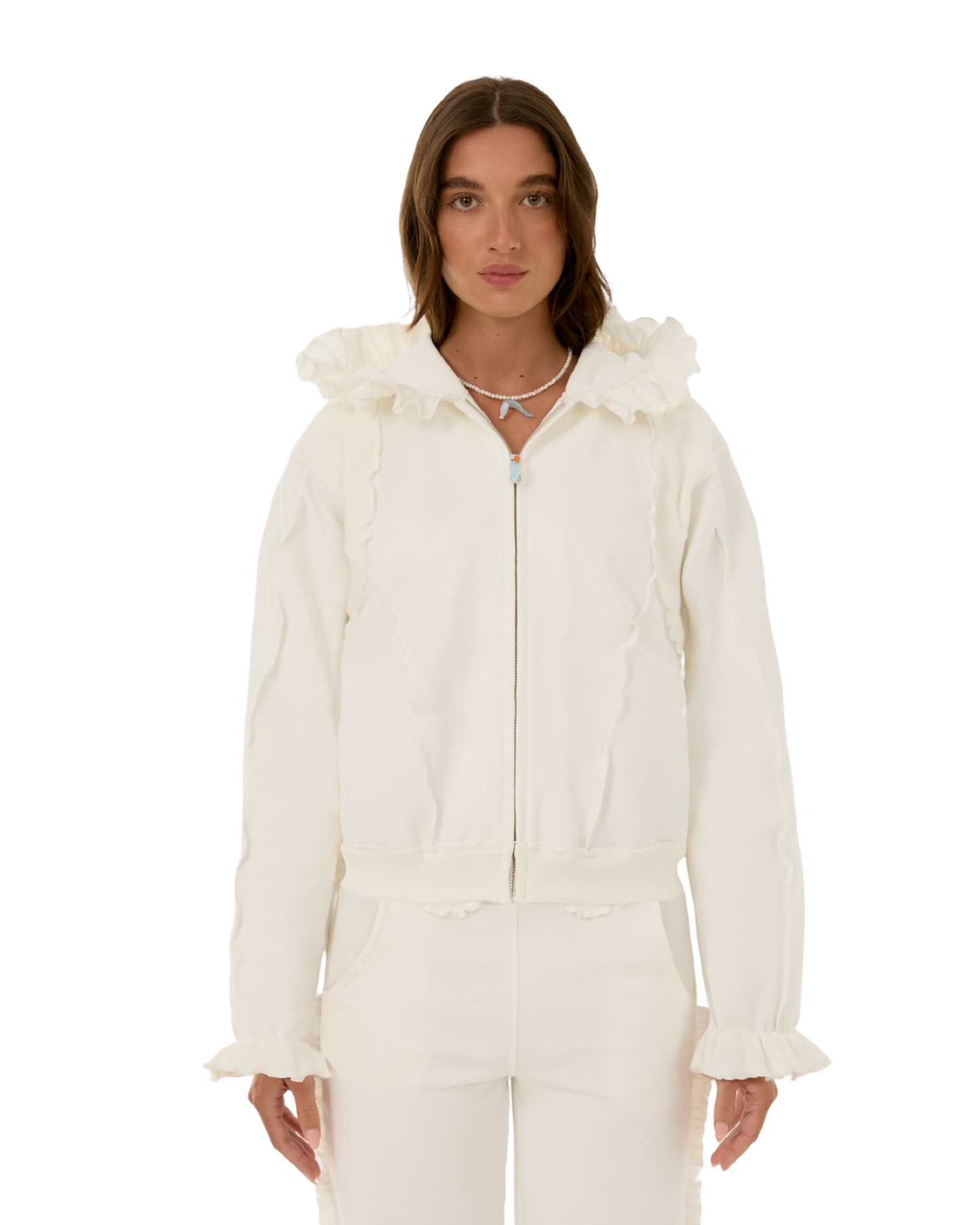White zip-up hoodie with ruffled hood and long sleeves with ruffled cuffs