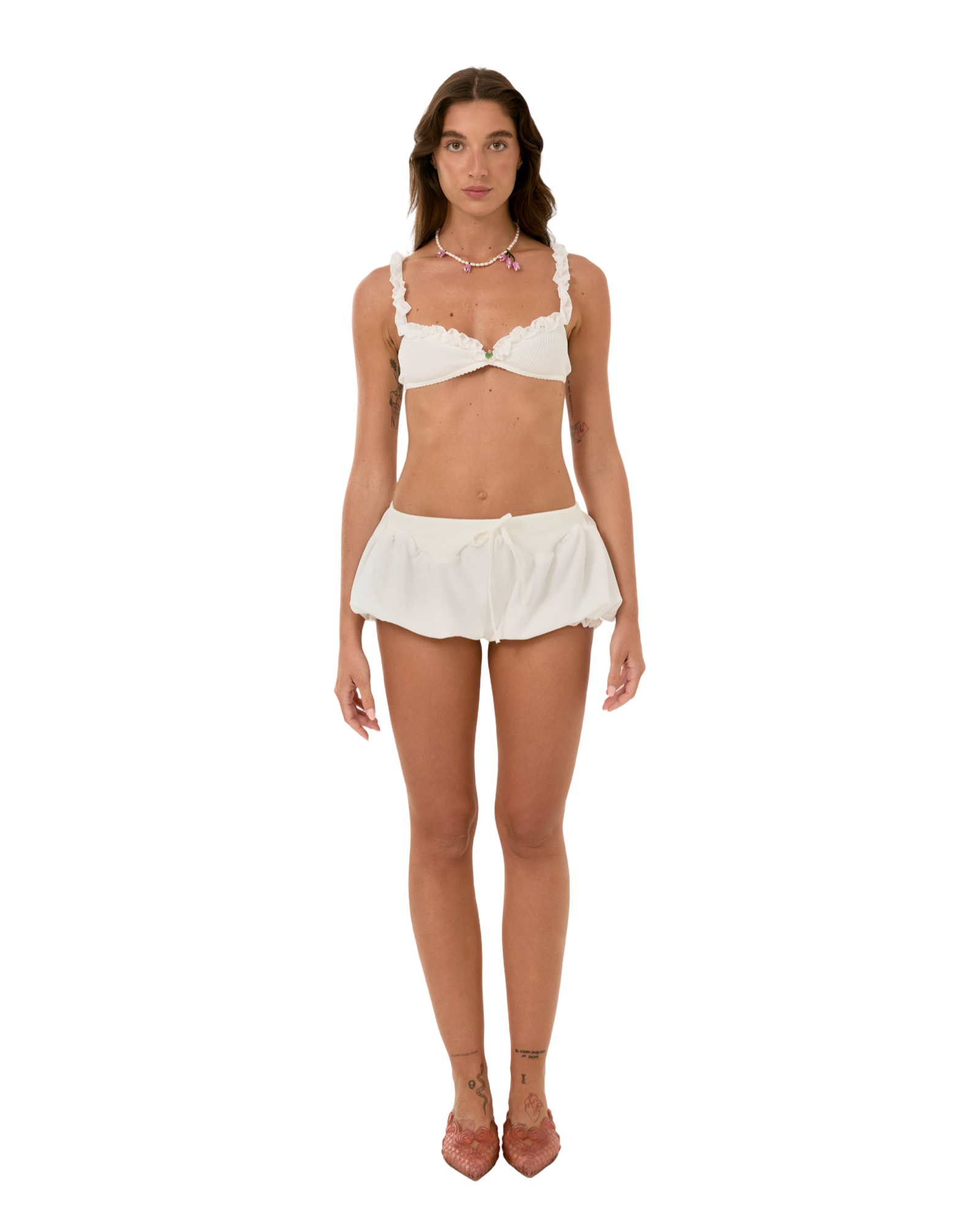 White micro shorts with scalloped ruffled edges and drawstring waist