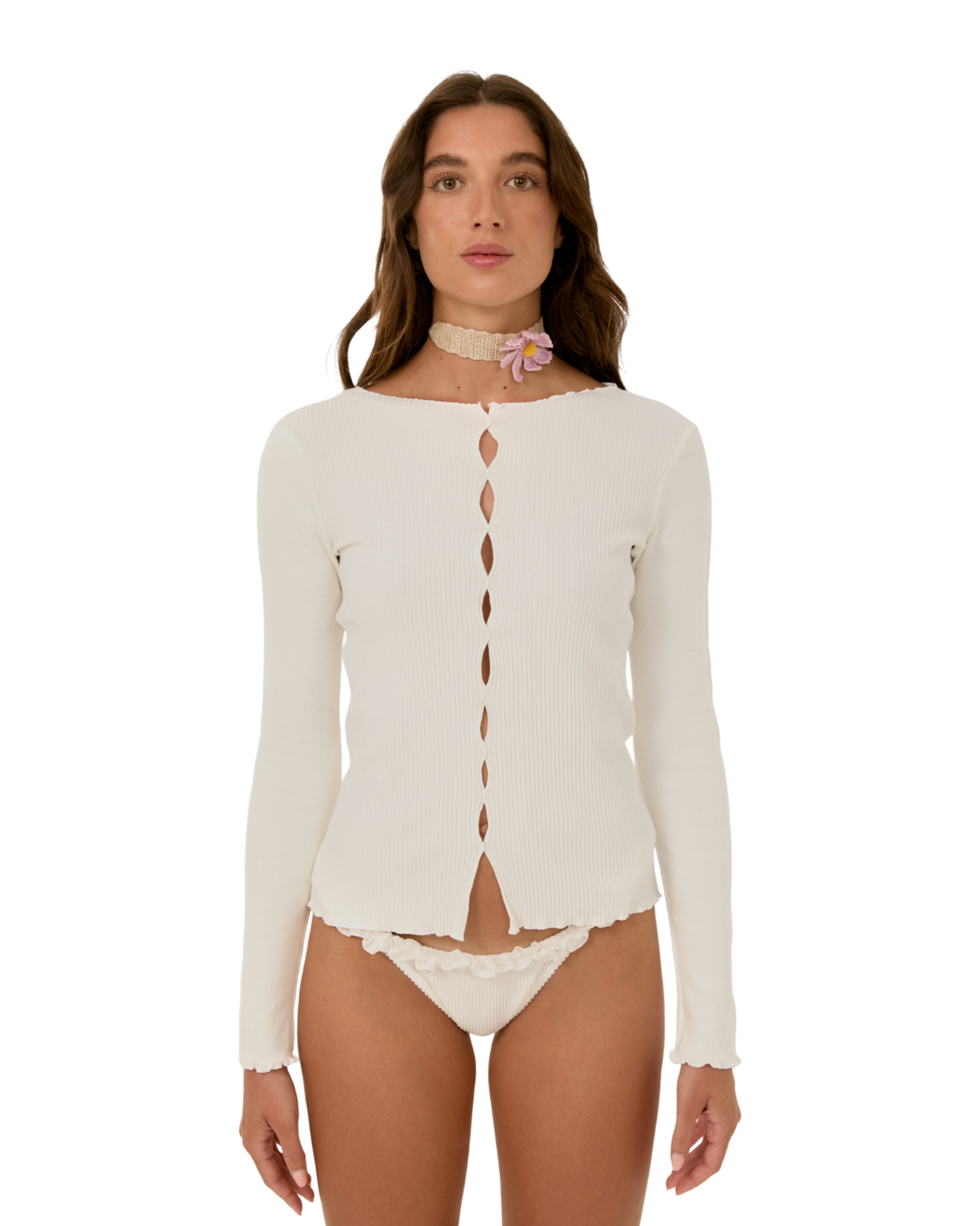 White long-sleeve ribbed top with keyhole neckline and center cutout buttons