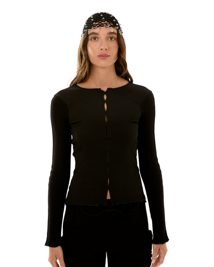 Black long-sleeve top with keyhole cutout and vertical button front