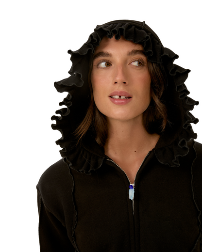 Black zip-up hoodie with ruffled hood and visible front zipper pull