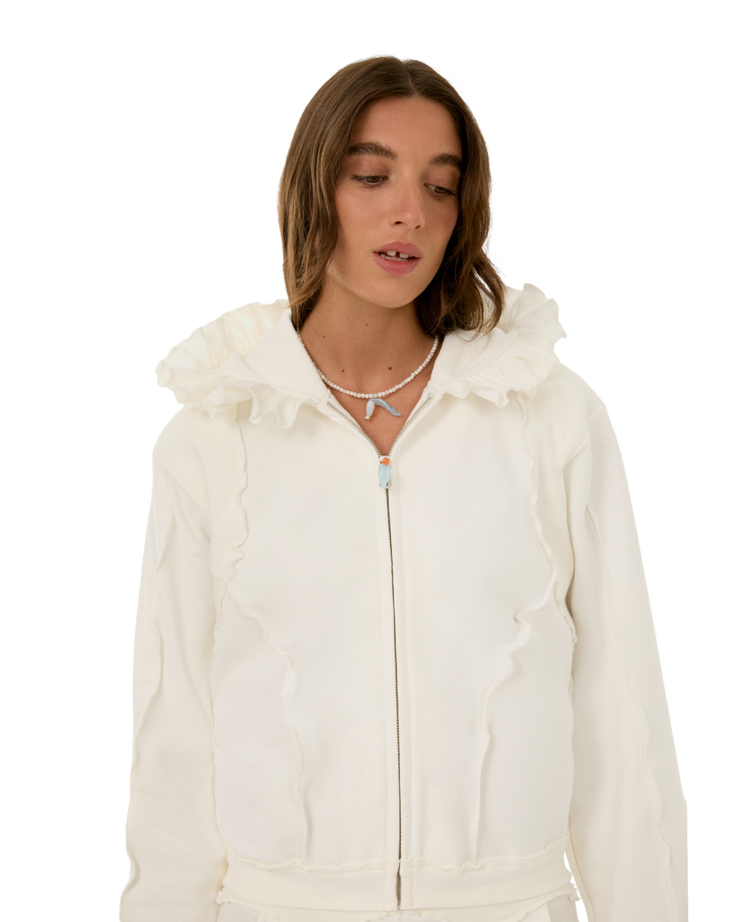 White zip-up hoodie with ruffled hood and visible front zipper