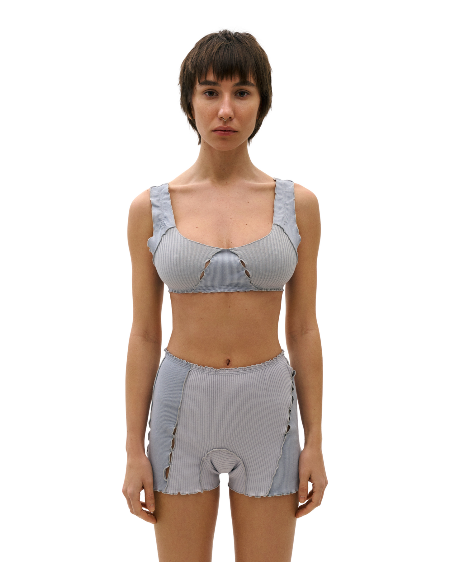 Light blue ribbed knit shorts with elastic waistband, scalloped hem, decorative loop stitching.