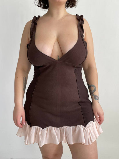 Brown mini dress with ruched bodice and pink ruffle hem, bow-tied shoulder straps