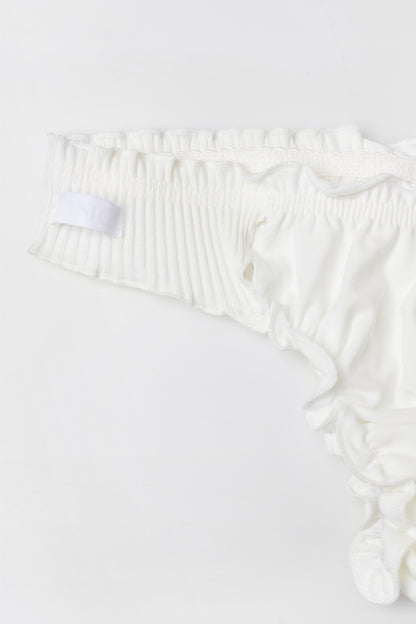 White tanga underwear detail, ruched stretch knit and scalloped ruffle trim