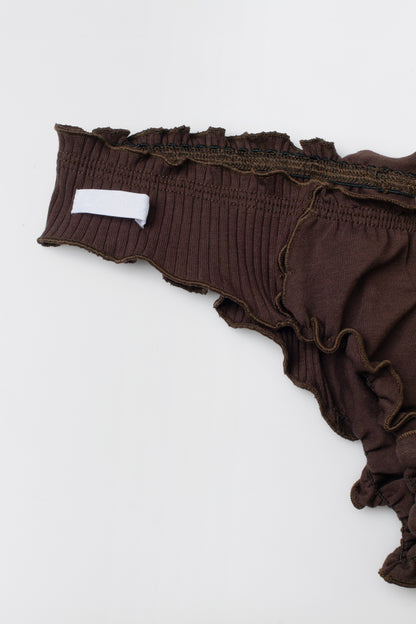 Brown tanga thong close-up with ribbed fabric and elastic waist trim