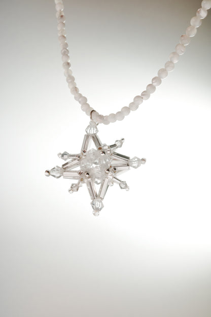 Star necklace with white bead strand and large crystal star pendant centerpiece