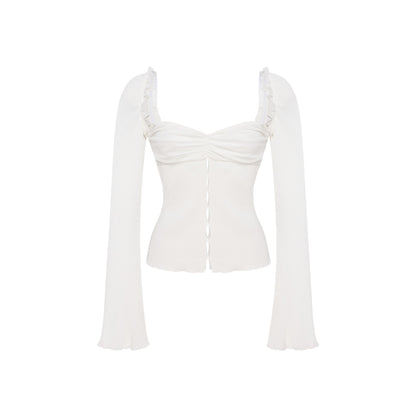 White top with draped sweetheart neckline and long flared sleeves, fitted ribbed knit