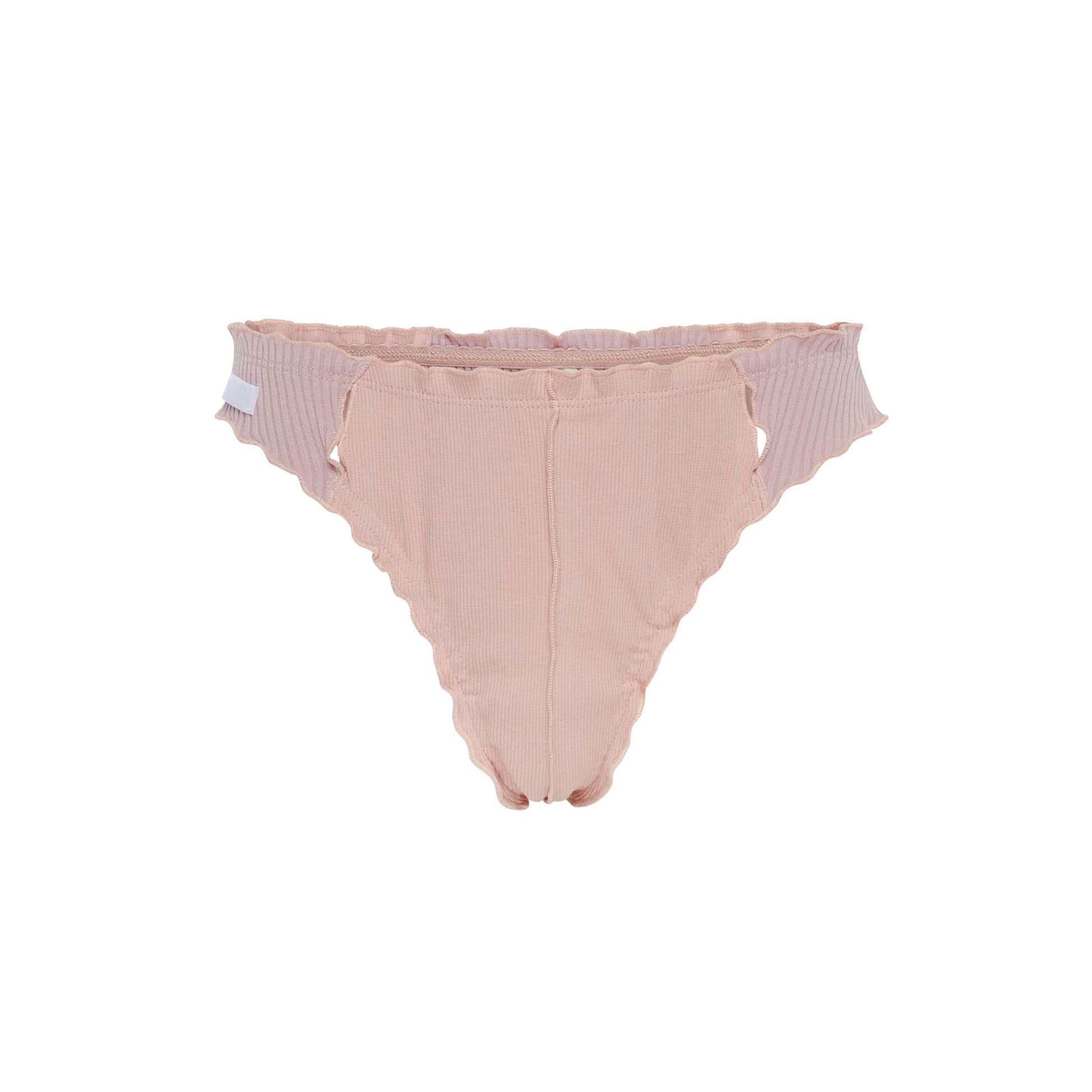 Pink ribbed thong with scalloped ruffle edges and seamless front seam