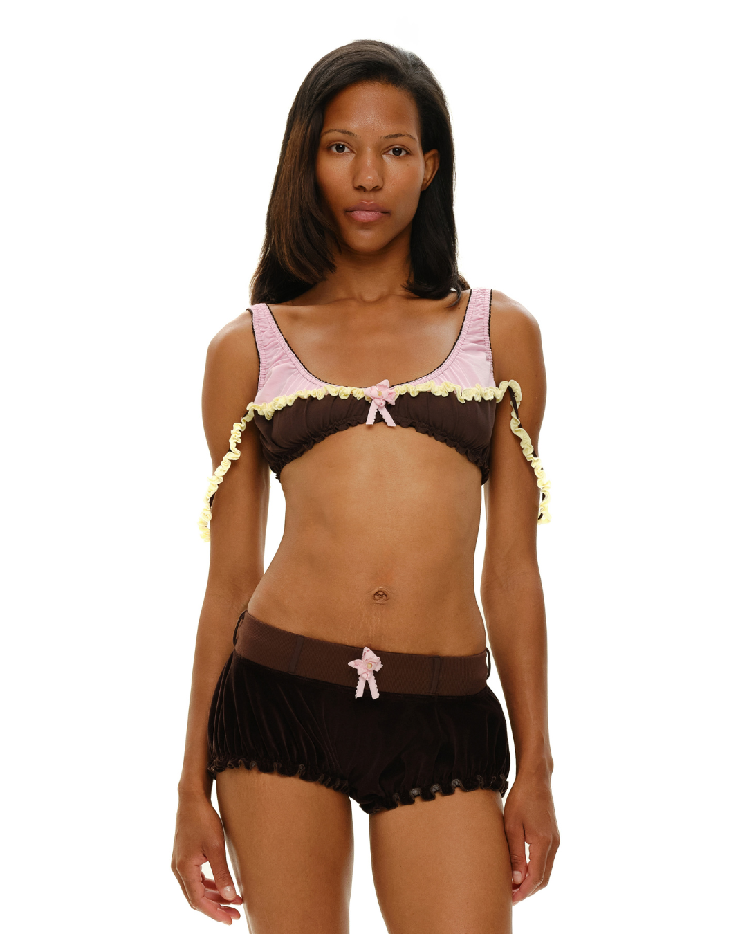 Ruffled lingerie bra with dark brown cups, pink trim, and scalloped edges