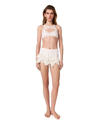 White lace double skort with tiered ruffle hem, elastic waistband, full-body view