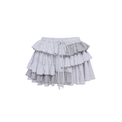 Light gray ruffle skort with tiered flounce layers and elastic drawstring waist
