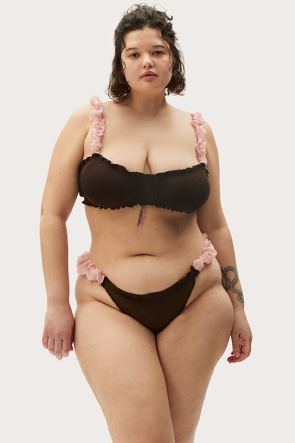 Brown thong with pink ruffled side seams and scalloped frill edges