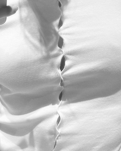 White draped T-shirt close-up of ribbed knit and center-front cutout placket